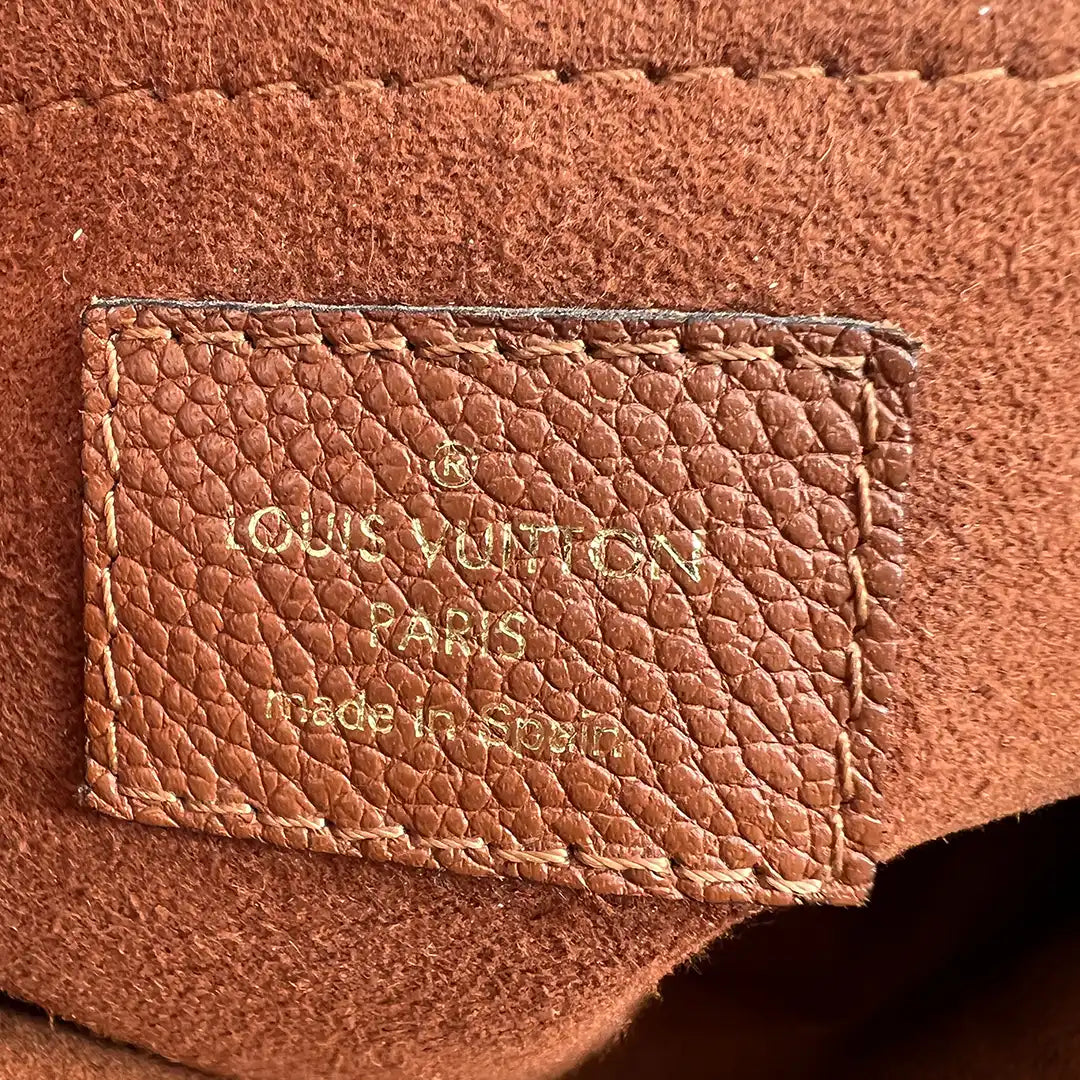 Louis Vuitton Saint Placide Monogram Canvas und Leder Tasche braun / sehr gut Louis Vuitton