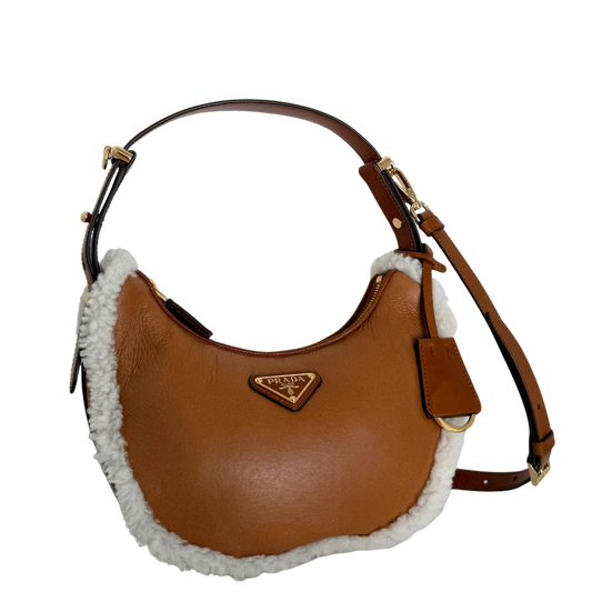 Prada small Arqué shoulder bag in lambskin Cognac / as new