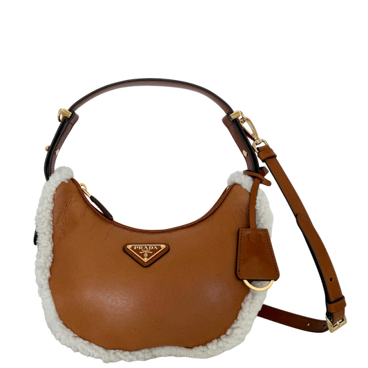 Prada small Arqué shoulder bag in lambskin Cognac / as new