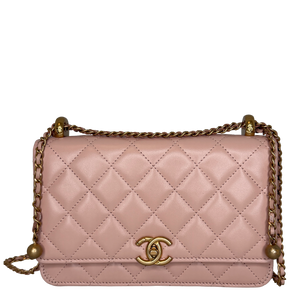 Chanel Wallet on Chain roze kalfsleer 2024