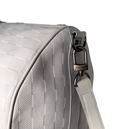 Louis Vuitton Infini Keepall 45 Bandoulière reistas lichtgrijs
