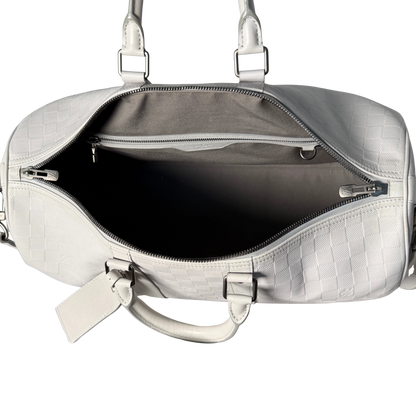 Louis Vuitton Infini Keepall 45 Bandoulière reistas lichtgrijs