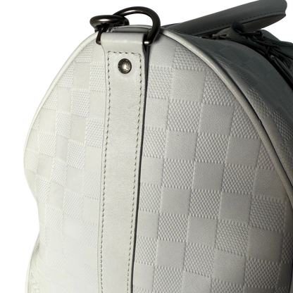 Louis Vuitton Infini Keepall 45 Bandoulière reistas lichtgrijs