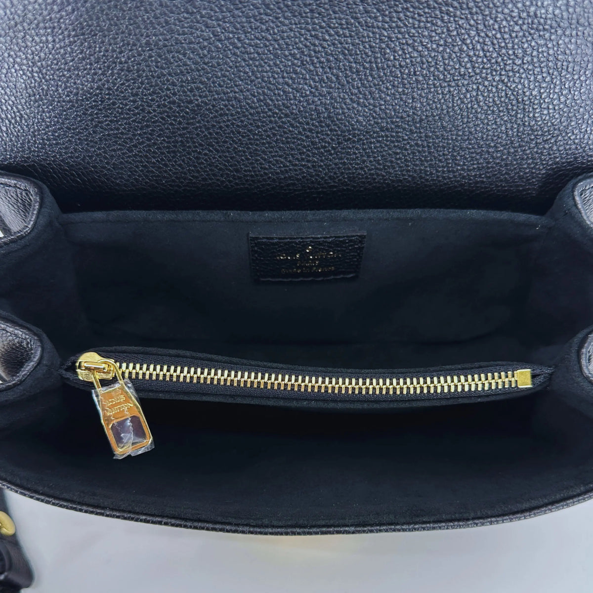 Louis Vuitton Pochette Métis East West Empreinte Leder schwarz / beige M46596 Fullset / neuwertig Louis Vuitton