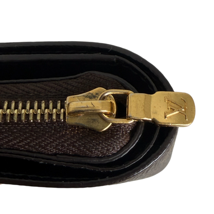 Louis Vuitton Lou Wallet Monogram Reverse Canvas Bruin Goud