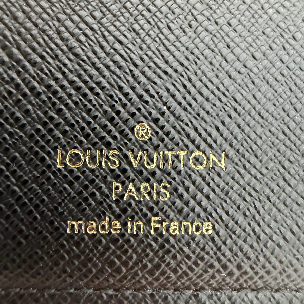 Louis Vuitton Lou Wallet Monogram Reverse Canvas Bruin Goud