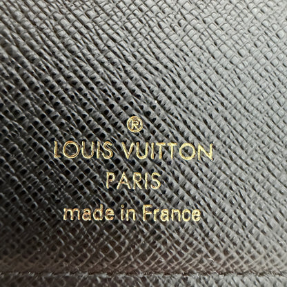 Louis Vuitton Lou Wallet Monogram Reverse Canvas Bruin Goud
