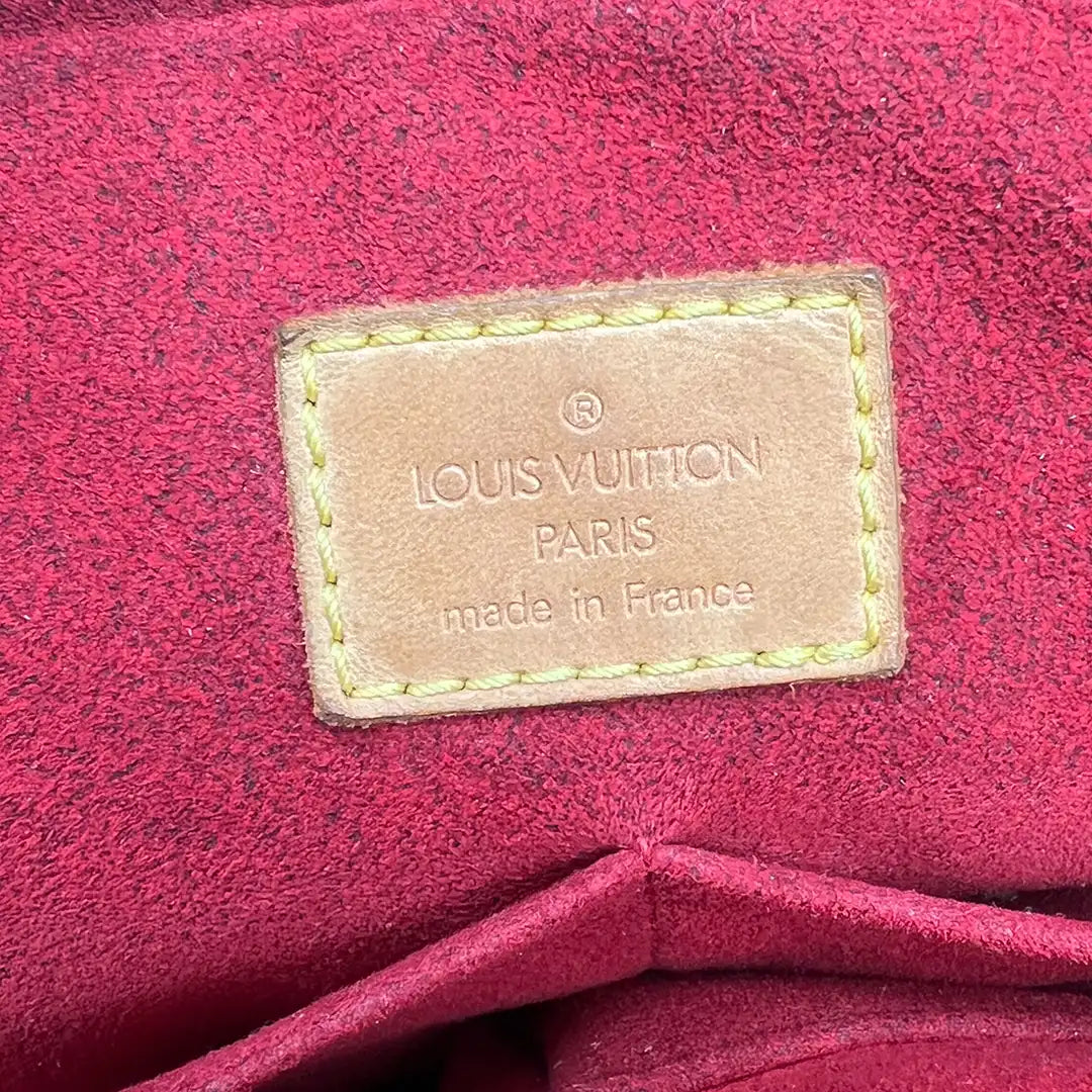 Louis Vuitton Multipli Cite GM Monogram Canvas / akzeptabel Louis Vuitton
