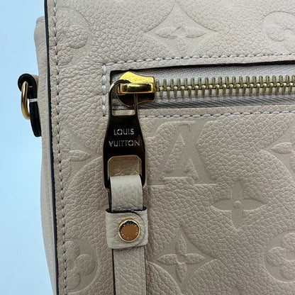 Louis Vuitton Pochette Métis Empreinte Leder Creme neuwertig / Fullset Louis Vuitton