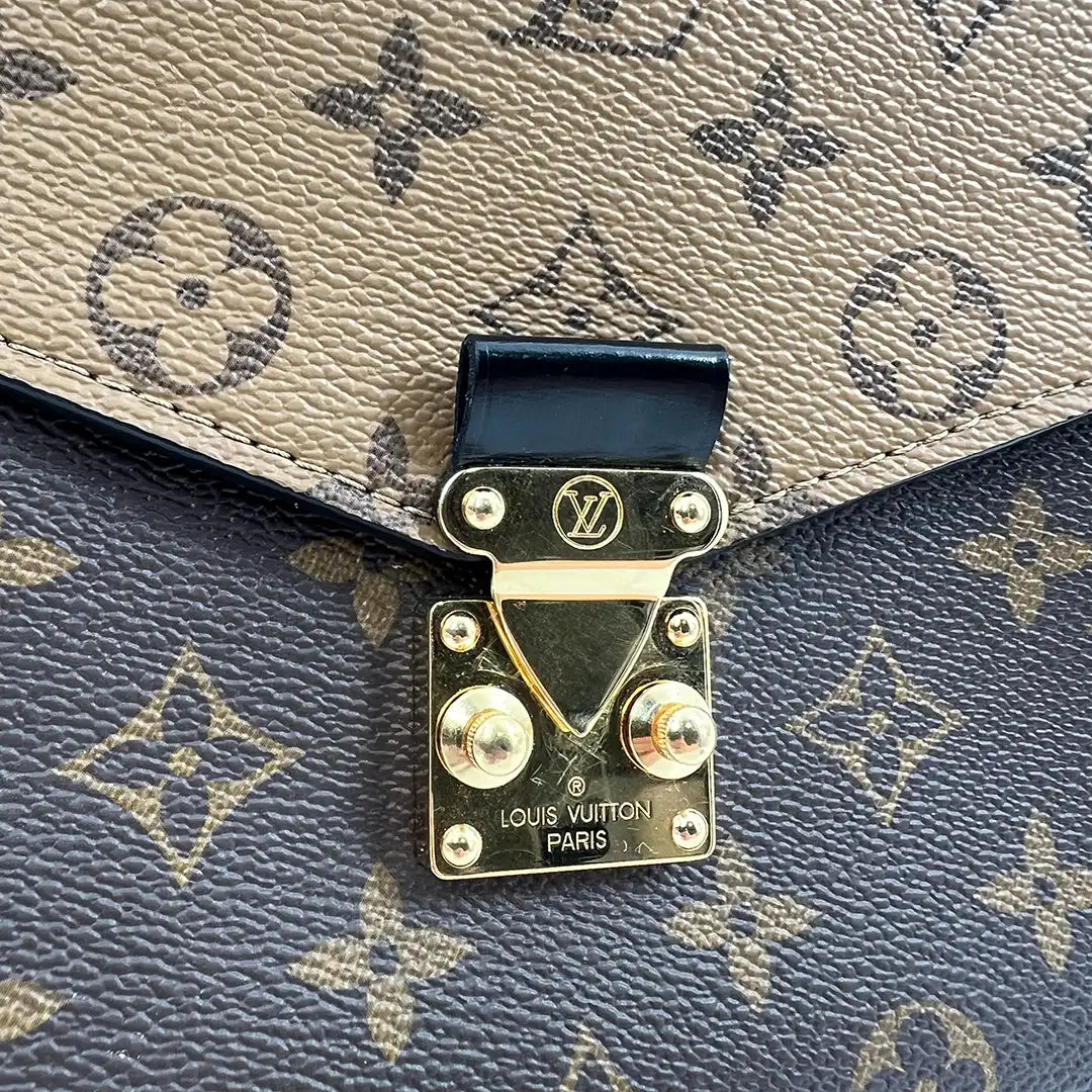 Louis Vuitton Pochette Métis Monogram Reverse Canvas M44876  / sehr gut Louis Vuitton