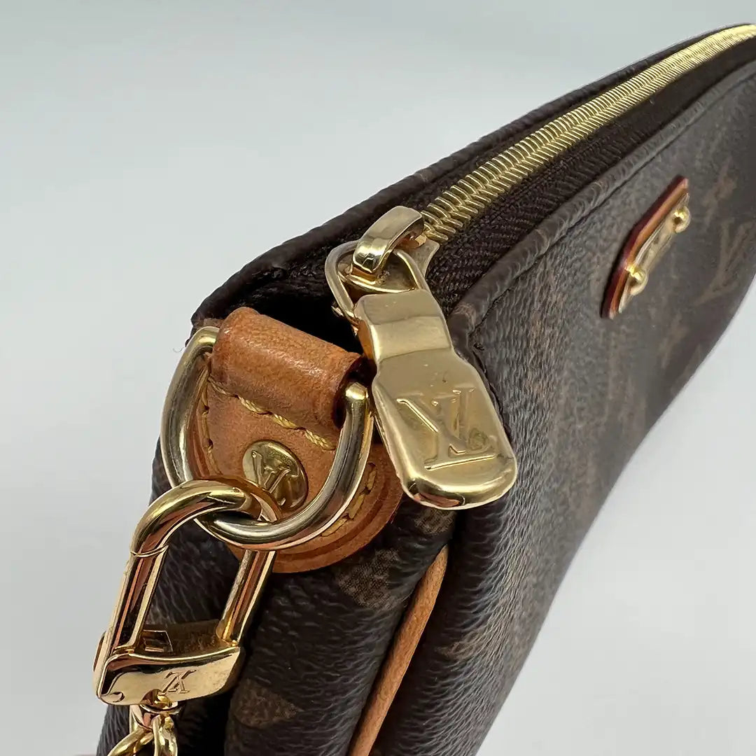 Louis Vuitton Pochette Eva Monogramm Canvas / sehr gut Louis Vuitton