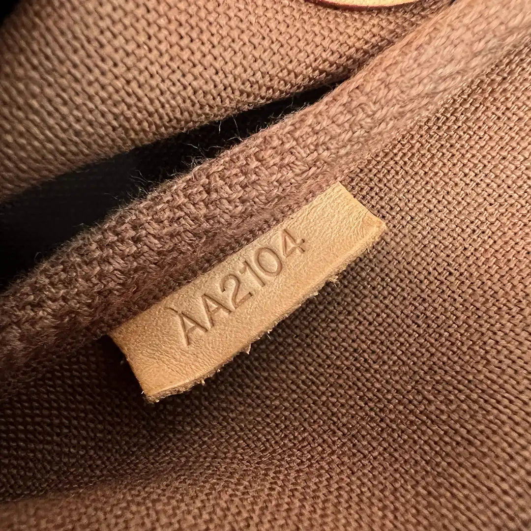 Louis Vuitton Pochette Eva Monogramm Canvas / sehr gut Louis Vuitton