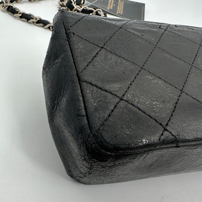 Chanel Mini Flap Bag schwarz Lammleder / akzeptabel Chanel