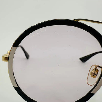 Gucci Damen GG0061S 006 Sonnenbrille, schwarz gold creme  56 / sehr gut Gucci